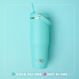 Turquoise tumbler with straw on a light blue background, featuring the Swig brand.