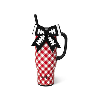 A red and white gingham patterned insulated tumbler with a black handle and black lid, decorated with a black and white football-themed bow and straw, on a white background.