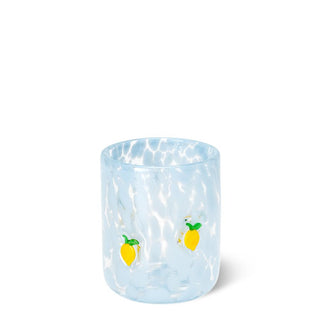 Clear glass tumbler with lemon designs on a white background