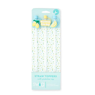 Packaged straw toppers with lemon design on a light blue background
