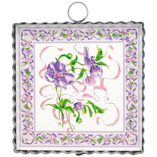Decorative panel with floral design and decorative border on a white background