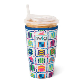 Colorful patterned swig tumbler with a straw on a white background