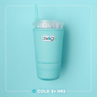 Turquoise swig tumbler with straw on a light blue background