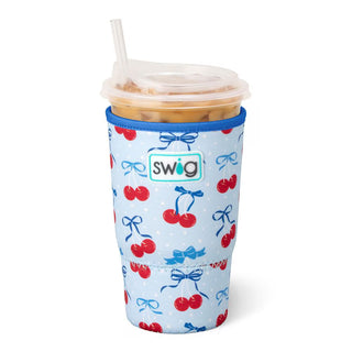 Swig tumbler with cherry and bow pattern on a white background