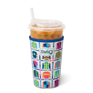 Colorful patterned swig tumbler with a drink on a white background