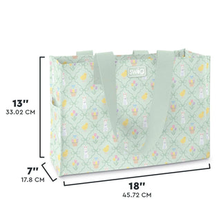 A mint green tote bag with a bunny and Easter egg pattern, shown with dimension lines and text indicating its measurements: 13 inches tall, 7 inches deep, and 18 inches wide.