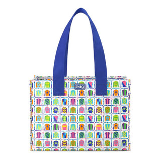 Colorful patterned tote bag with blue handles on a white background