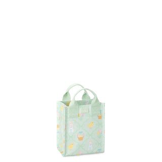 Small green gift bag with colorful patterns on a white background