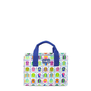 Colorful bag with a pattern of colorful boxes and a blue handle on a white background