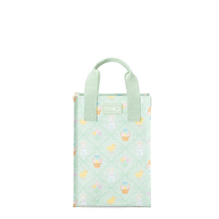 Small green quilted bag with Easter-themed design on a white background