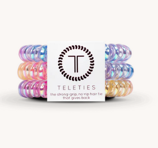 Set of colorful hair ties with 'Teleties' packaging on a white background