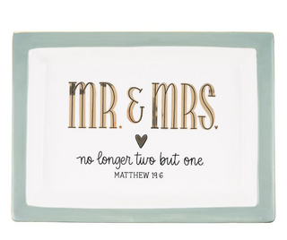 Decorative sign with 'Mr. & Mrs.' text on a white background