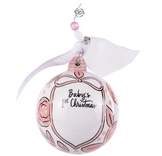 Decorative ornament with 'Baby's 1st Christmas' text on a white background
