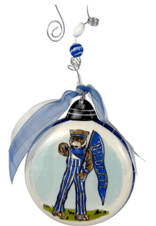 Decorative ornament with a mascot in a blue uniform and 'Wildcats' banner, on a white background.