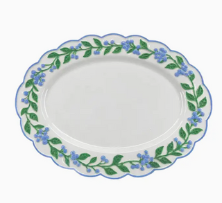 scalloped platter on a white background