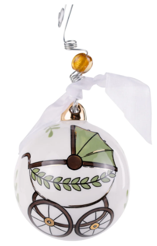 Decorative ornament with a baby carriage design on a white background