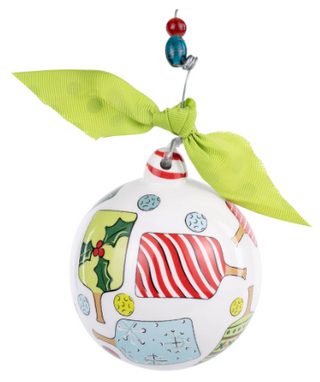 Decorative Christmas ornament with colorful design and green ribbon on a white background
