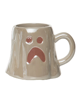 A beige ceramic mug shaped like a sad ghost with a pinkish-red frown and eyes, shown on a plain white background.