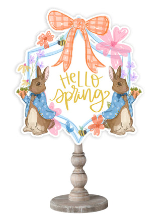 Decorative sign with bunnies, flowers, and 'Hello Spring' text on a white background