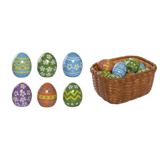 Colorful Easter eggs with patterns in a wicker basket on a white background