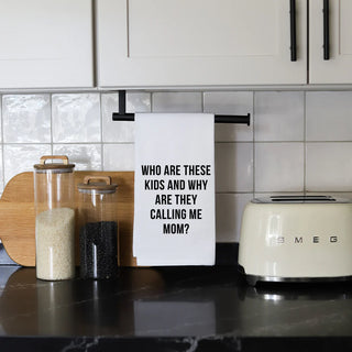 Kitchen counter with a humorous towel and Smeg toaster