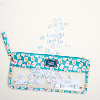 Tile storage pouch with colorful tiles on a white background