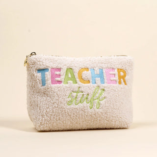 Fuzzy pouch with 'Teacher Stuff' text on a beige background