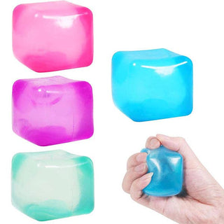Colorful silicone ice cube molds on a white background