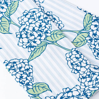 Floral pattern with blue and green flowers on a striped background