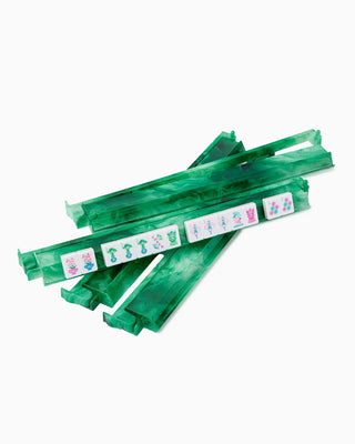 Green ribbons with decorative labels on a white background