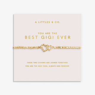 Gold bracelet with heart charms on a card that reads 'You are the best gigi ever' by A Littles & Co.