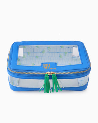 Blue travel pouch with green tassel on a white background