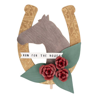Decorative horseshoe with floral elements and 'Run for the Roses' text on a white background