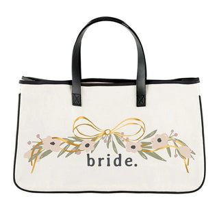 White tote bag with black handles and floral design with 'bride' text on a white background
