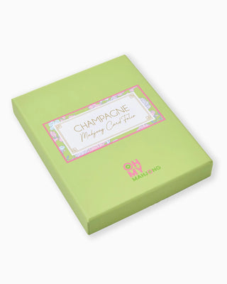 Green box with a card labeled 'Champagne Mahjong Card Folio' on a white background