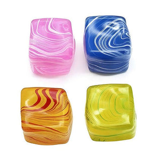 Four square glass coasters with rounded corners arranged in a 2x2 grid on a white background. The coasters feature marbled swirl patterns in pink and white, blue and white, orange and red, and yellow and green.