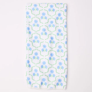 Floral patterned fabric with blue flowers on a white background