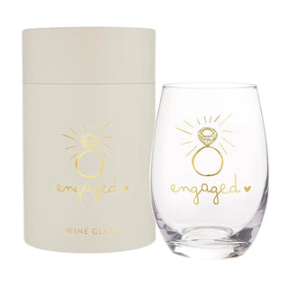 Clear wine glass with 'engaged' design and matching gift box on a white background