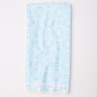Light blue patterned towel on a white background
