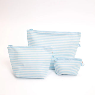 Three light blue and white striped zippered pouches in different sizes arranged on a clean white background.