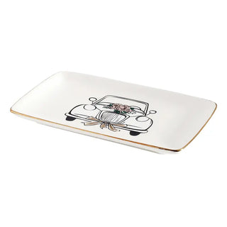 White ceramic tray with a black car illustration and gold rim on a white background