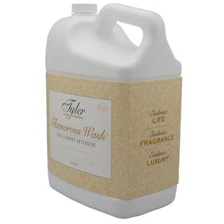 Gallon jug of Tyler Glamorous Wash laundry detergent on a white background