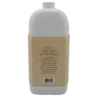 Bottle with a beige label and white cap on a white background
