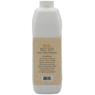 Bottle with a white cap and beige label on a white background