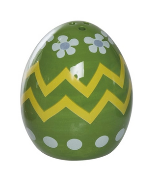 Decorative green egg with yellow zigzag pattern and white flowers on a white background