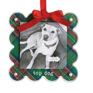 Decorative ornament with a plaid border, red ribbon, and photo of a dog with 'top dog' text.