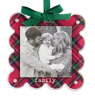 Decorative photo ornament with plaid design and family photo inside, featuring a green ribbon.