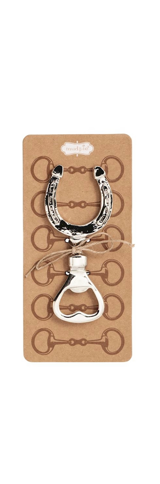 Horseshoe-shaped bottle opener on a cardboard backing with horse shoe design.