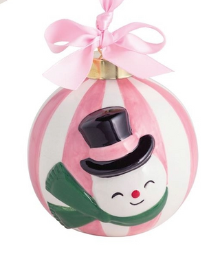 Decorative ornament with a snowman design on a pink and white striped background