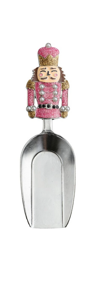 Decorative ice scoop with a nutcracker design on a white background